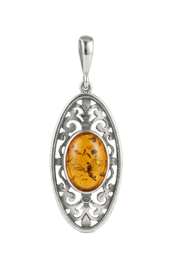 Pendentif ambre et argent ciselé poli